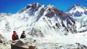 Hikers enjoing magnificent view of Mount Everest base camp.
