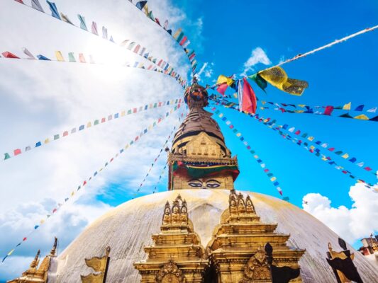 stupa temple in kathmandu nepal with prayer flags