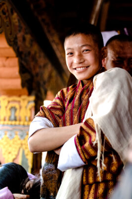 young-buddhist-monk-at-festival-in-bhutan